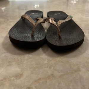 Slightly worn Sanuk women’s flip flops